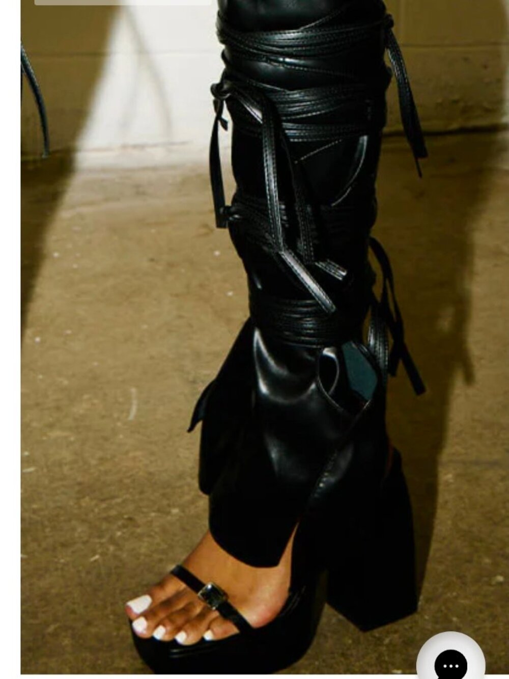 Knee high strapped sandle